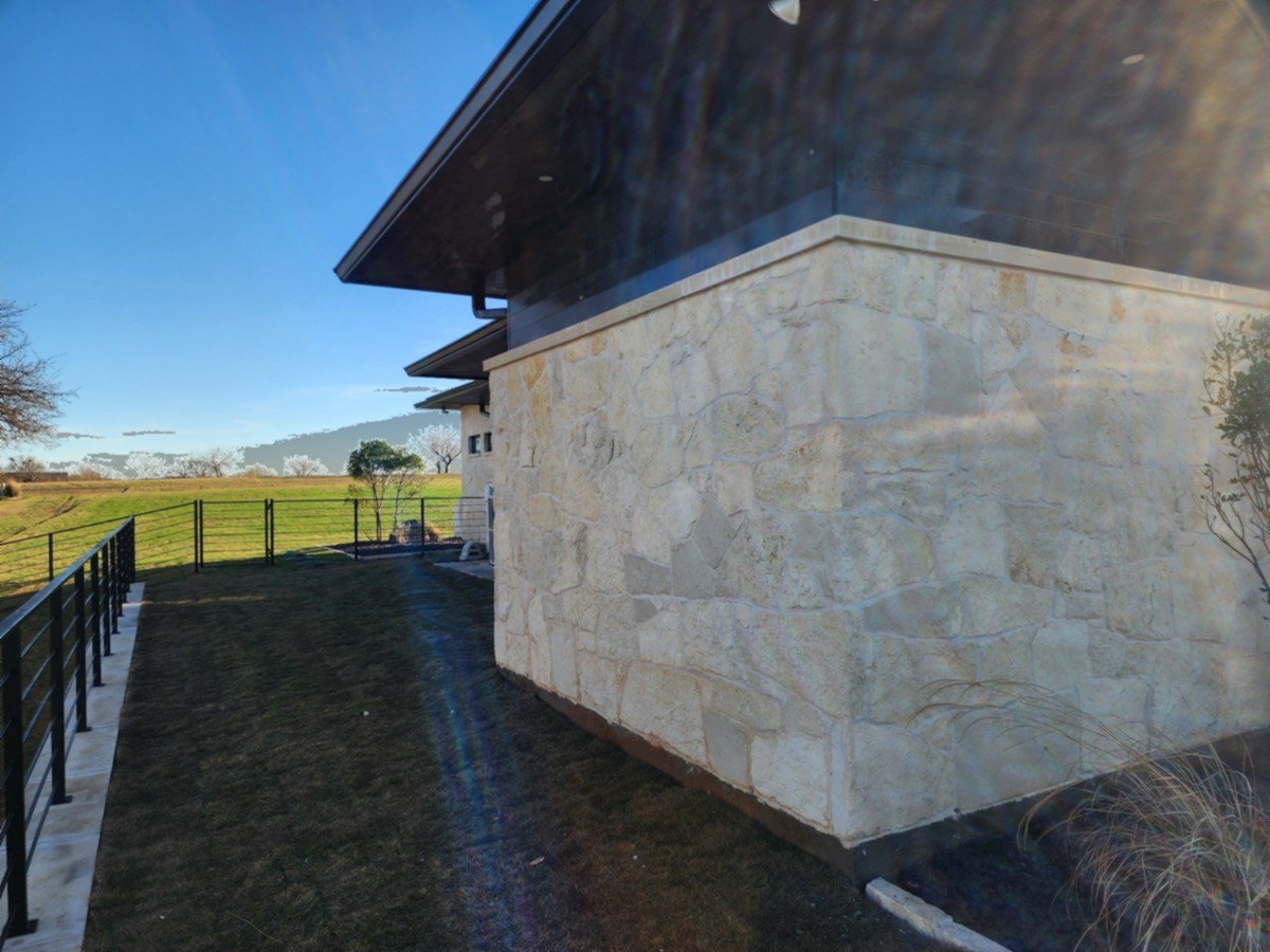 House exterior after washing in Streetman TX showing clean limestone exterior